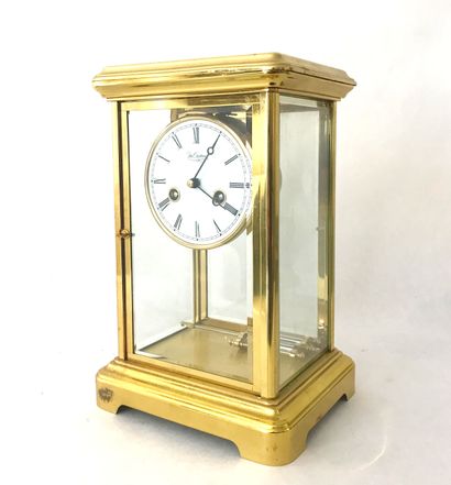 Pendule cage en métal doré et verre.
H :...