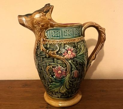 Pichet zoomorphe en barbotine polychrome...
