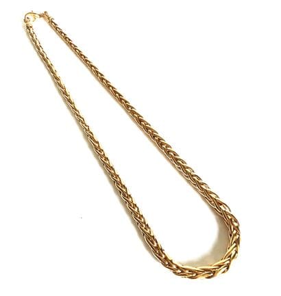 Collier en métal doré à mailles palmier 
L....