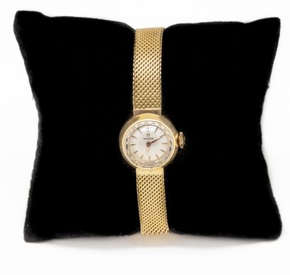 OMEGA 
Ladies' wristwatch in 18 K (750/1000)...