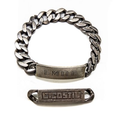 Lot comprising a silver bracelet, the engraved...