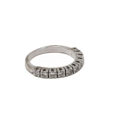 American half wedding band in 18 K (750/1000)...