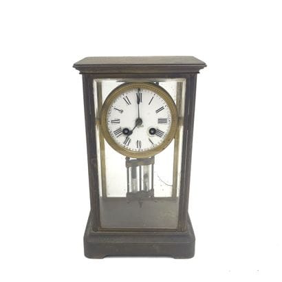 Set of 2 brass clocks, including: 
-JAPY...