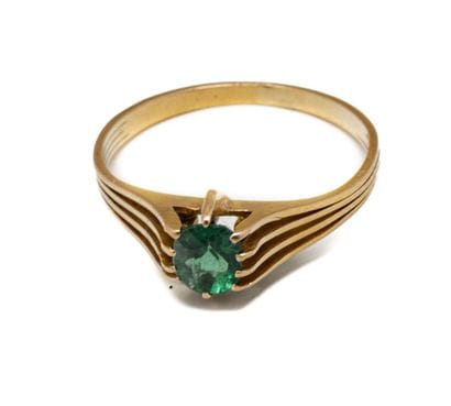 Bague à monture en or jaune (18K/750) épaulement...