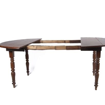 Oval-shaped dining table made of natural...