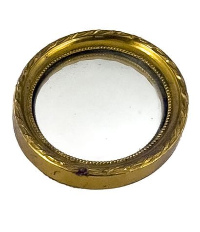 Curved glass witch's mirror
Gold-plated metal...