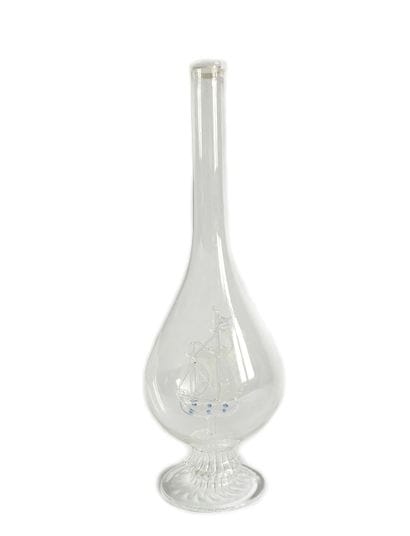 Clear glass single-flower vase with an interior...