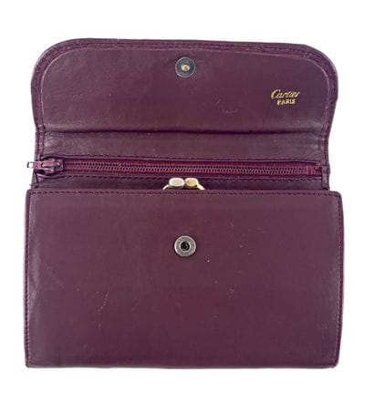 CARTIER Paris
Burgundy leather women's wallet,...
