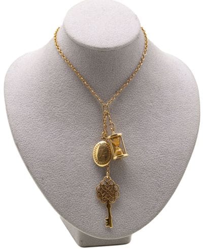 INES DE LA FRESSANGE. 
Collier en métal doré...