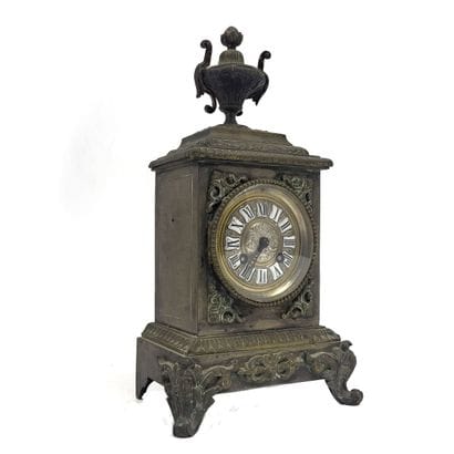 Set of 2 brass clocks, including: 
-JAPY...