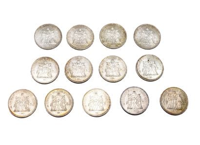 FRANCE
Lot de 13 pièces de 50 Francs en argent...