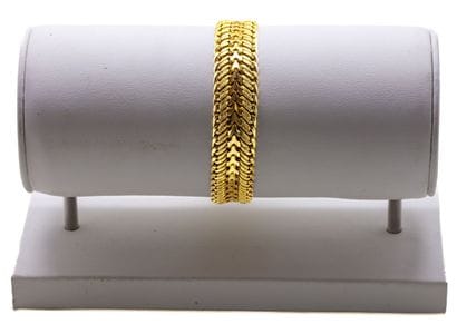 Large gourmette en or jaune 18 K (750/1000)...