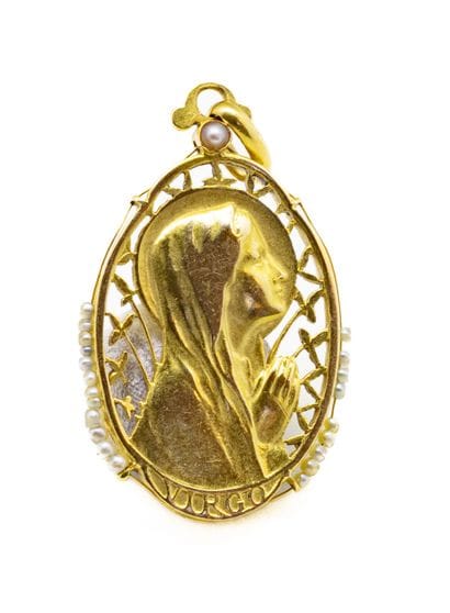 Médaille en or jaune 18 K (750/1000) représentant...