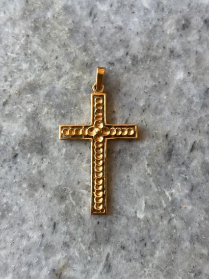 Baptismal cross in 750 thousandths gold.
Net...