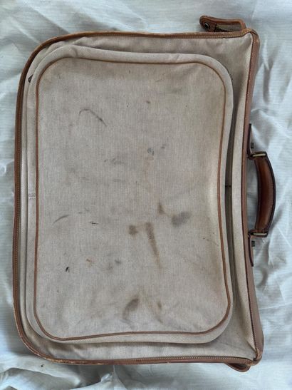 HERMES PARIS. 
Leather and ecru canvas suitcase....