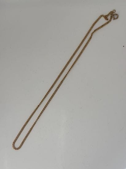 750-karat yellow gold chain (eagle head hallmark).
Net...