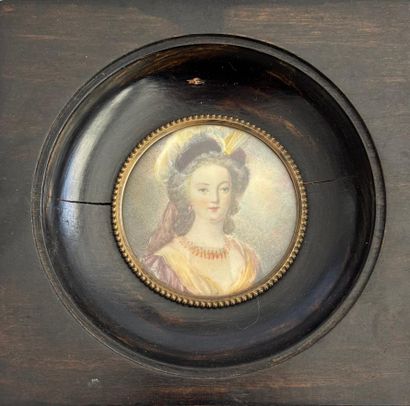 Miniature depicting a woman with a yellow...