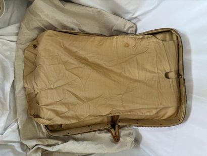 HERMES PARIS. 
Leather and ecru canvas suitcase....