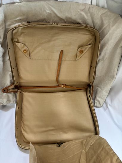 HERMES PARIS. 
Leather and ecru canvas suitcase....