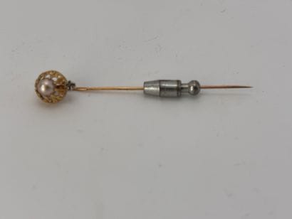 Tie pin in yellow gold, set with a small...