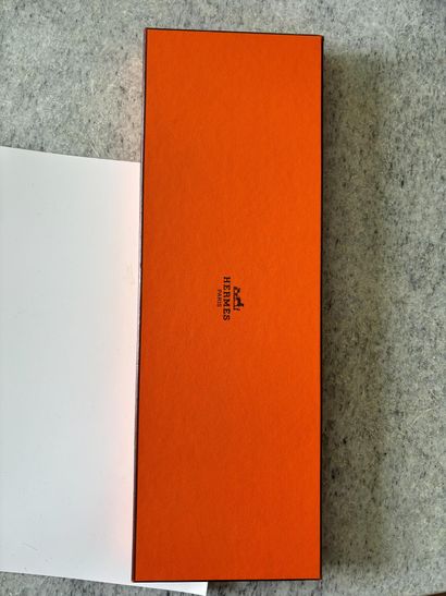 HERMES PARIS. 
Silk tie printed with stylized...
