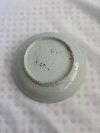 China. 
A small stock bowl and two saucers...