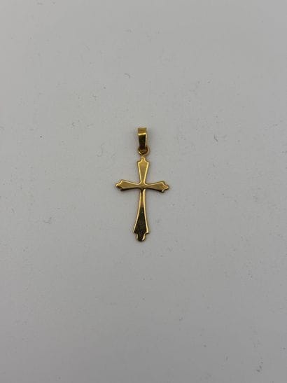 Small gold cross.
Net weight: 0.5 g.