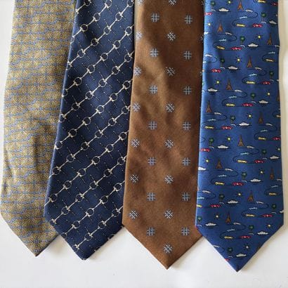 HERMES. 
Set of four ties, three with printed...