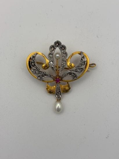 Small gold and silver pendant brooch with...