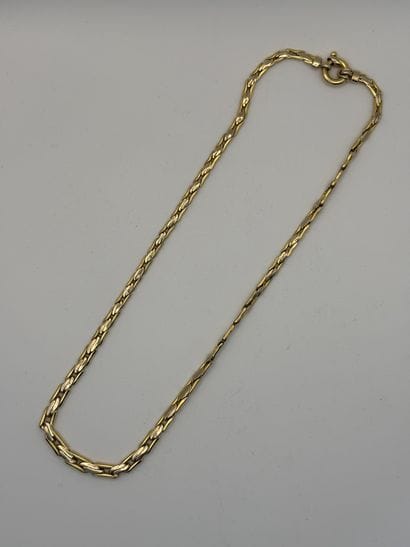 750 thousandths yellow gold chain.
Net weight:...