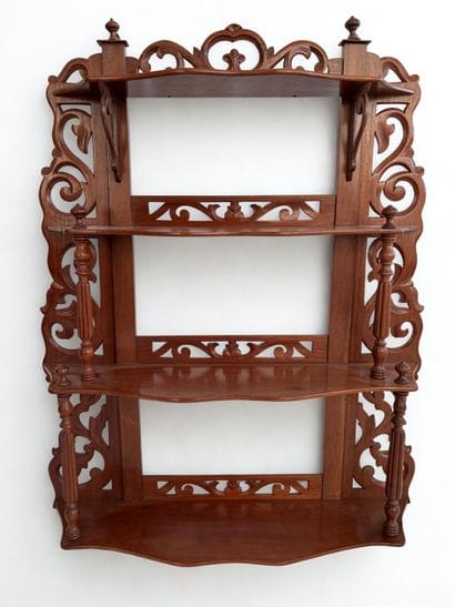 Two wall shelves in molded and carved wood,...