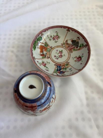 China. 
A small stock bowl and two saucers...