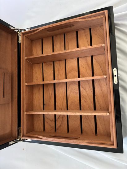 CHRISTOFLE. 
Black lacquered teak cigar box,...