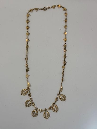 Openwork gold necklace.
Net weight: 15.5...