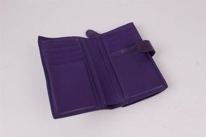 BOTTEGA VENETA 
Porte feuille en cuir tressé...