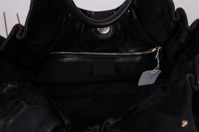 GUCCI 
Sac besace 35 cm en toile monogrammée...