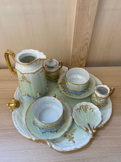 LIMOGES

Service à thé en porcelaine à décor...