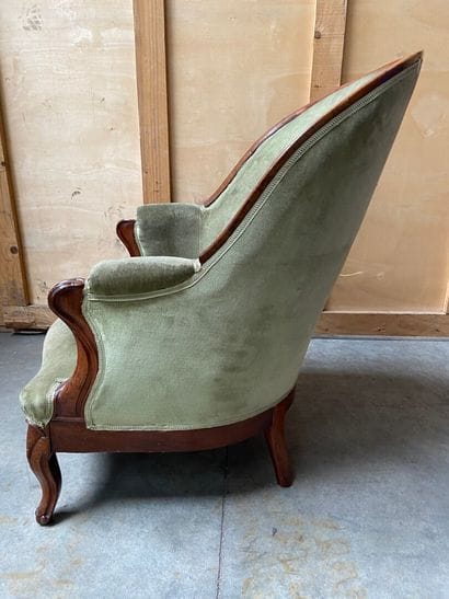 BERGERE en acajou et placage d'acajou mouluré,...