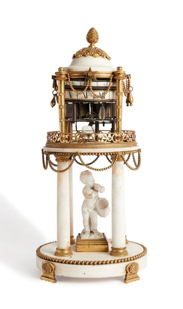 Clock with rotating circles, in the shape...