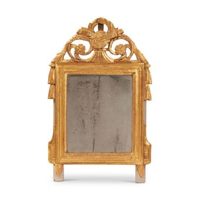 Small gilded wood mirror with openwork decoration...