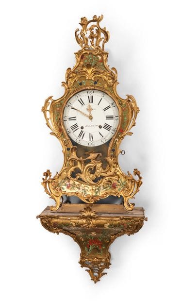 Wall clock with polychrome inlays on a brass...