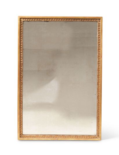 Rectangular mirror in wood and gilded stucco...