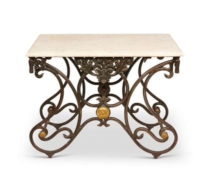 Table in wrought iron, patinated and gilded...