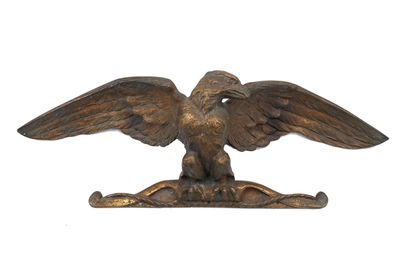 Aigle aux ailes déployées en bronze doré.
XIXe...
