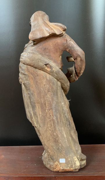 Sujet en bois sculpté et partiellement doré...