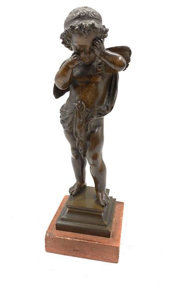 Statuette en bronze à patine brune figurant...