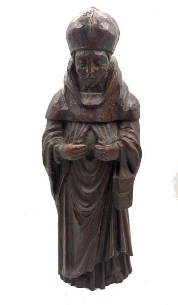 Sujet en bois sculpté figurant un Saint.
XIXe...