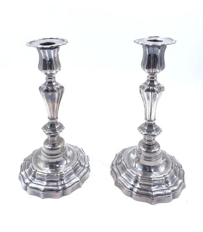 Pair of silver-plated torches, the baluster...