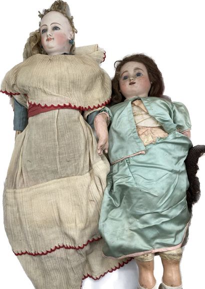 Set including three porcelain head dolls...