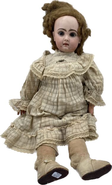 French doll with bisque head and closed mouth....
